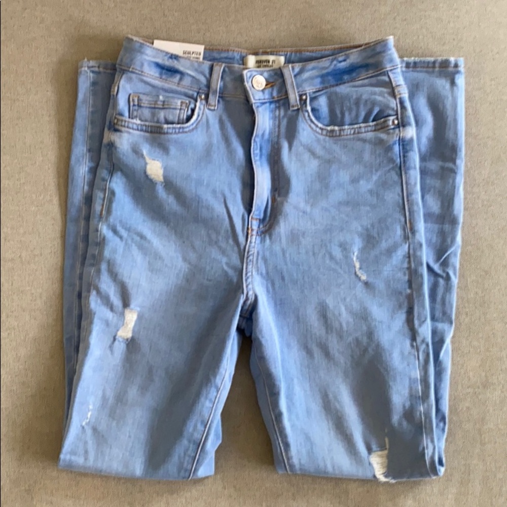 Sculpted Distressed High Rise Skinny Jeans